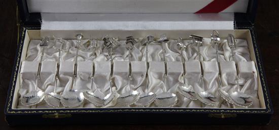 A set of twelve Japanese novelty silver teaspoons, early 20th century, each approx. 10.5cm, cased